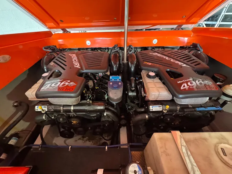 Slide: The Image of 2007 Baja 35 Outlaw boat engines, featuring dual Mercury 496 MAG HO motors. - 14