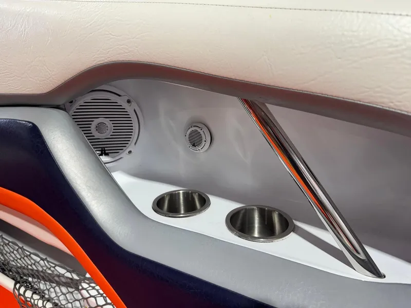 Slide: The Image of Interior of 2007 Baja 35 Outlaw boat with speakers and cup holders. - 4