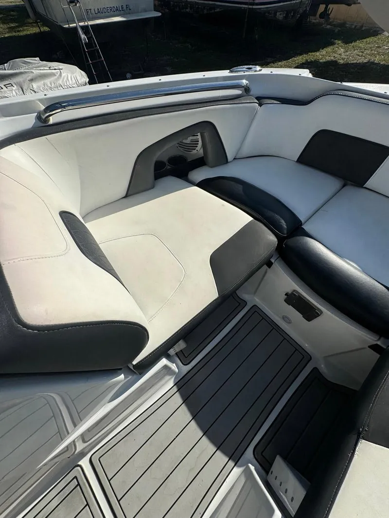 Slide: The Image of 2020 Monterey M45 boat interior with sleek white and black seating design. - 10