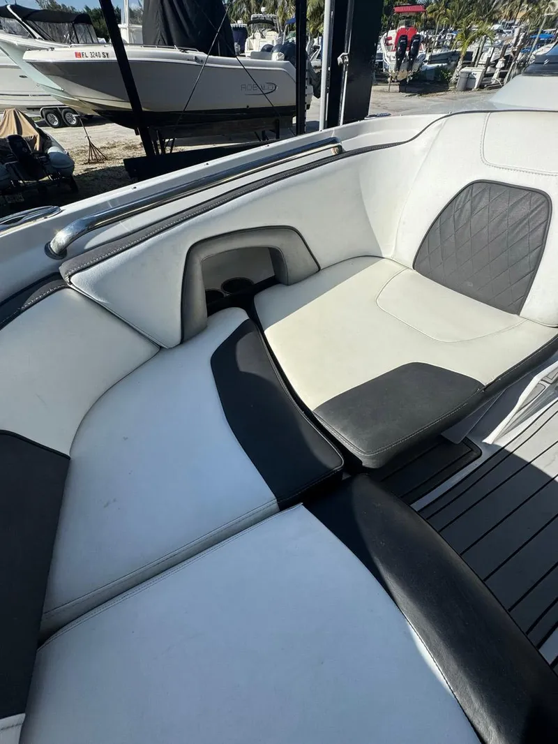 Slide: The Image of 2020 Monterey M45 boat interior with white and black seating. - 12