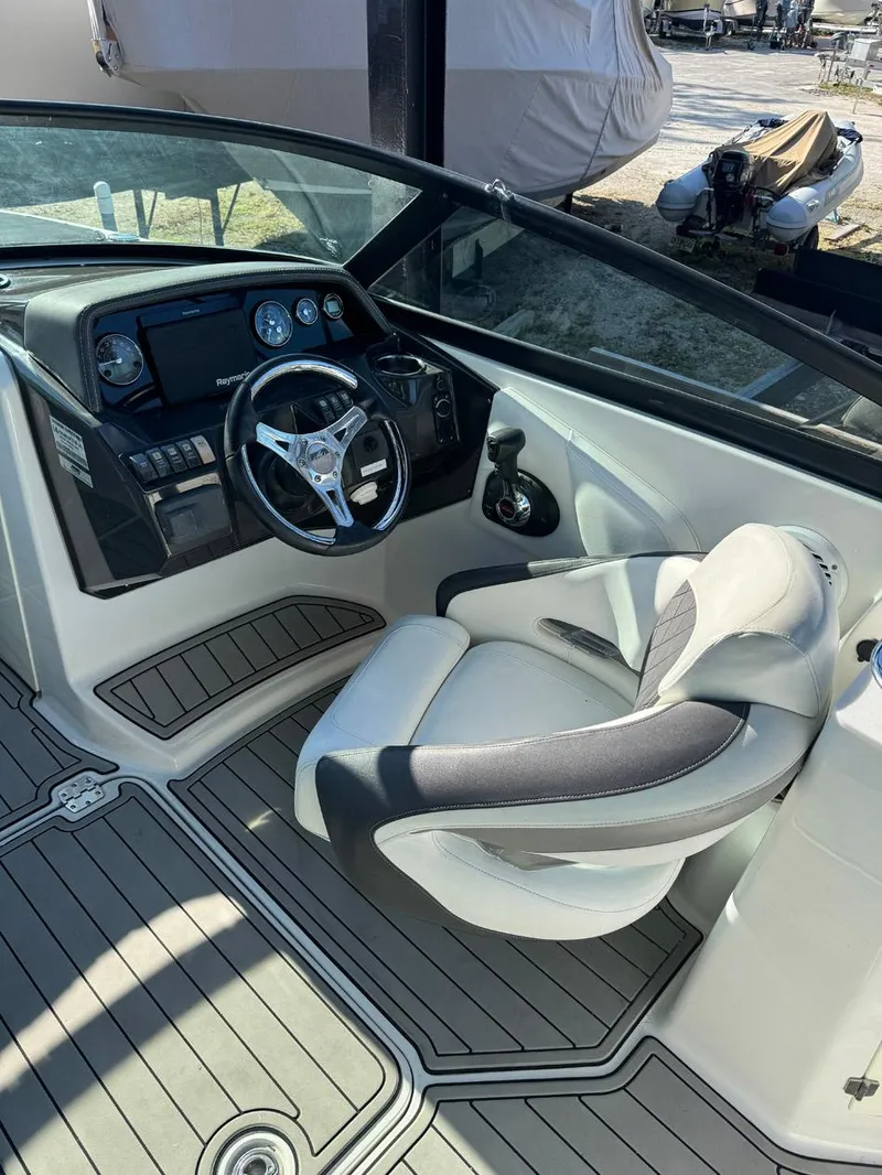Slide: The Image of 2020 Monterey M45 boat cockpit with steering wheel and comfortable seating. - 4