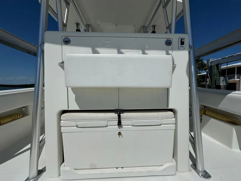 Slide: The Image of 2014 SeaVee 390B Center Console boat with storage compartments and cooler. - 16