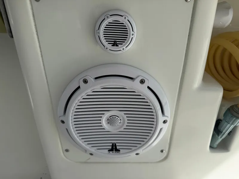 Slide: The Image of Speakers on 2014 SeaVee 390B Center Console boat, featuring white grilles and marine design. - 25
