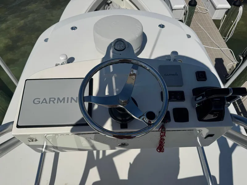 Slide: The Image of 2014 SeaVee 390B Center Console helm with Garmin navigation system. - 32