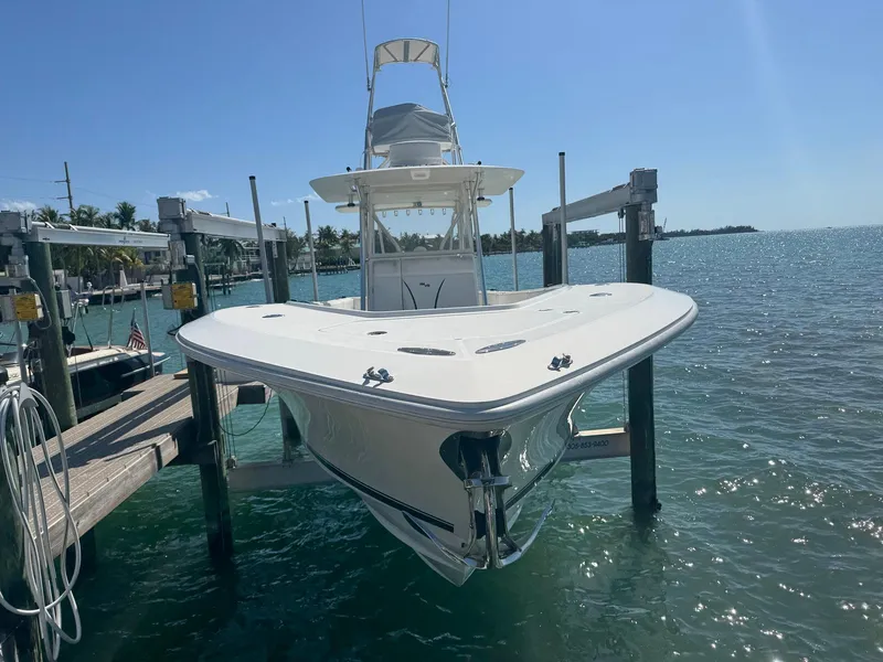 Slide: The Image of 2014 SeaVee 390B Center Console boat docked on a sunny day. - 6