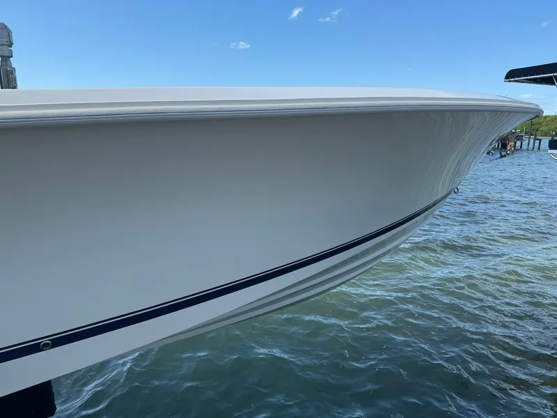 Slide: The Image of 2014 SeaVee 390B Center Console boat on water, side view. - 7