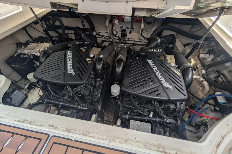 Slide: The Image of Engine compartment of 2008 Sea Ray 340 Sundancer with twin MerCruiser engines. - 16
