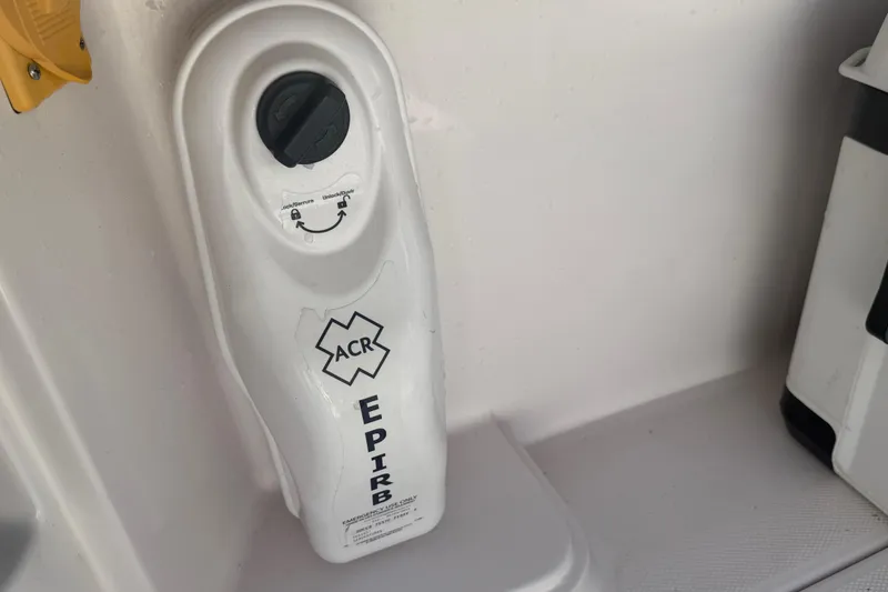 Slide: The Image of EPIRB device on 2017 Fountain 38 Sportfish Cruiser for emergency location signaling. - 17