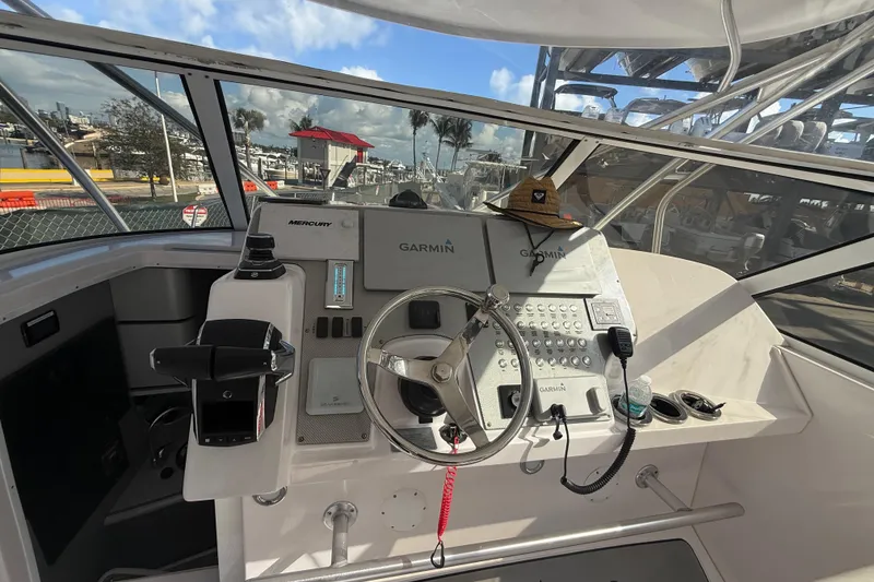 Slide: The Image of Cockpit of 2017 Fountain 38 Sportfish Cruiser with Garmin navigation system. - 30