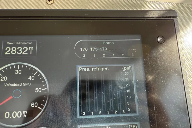 Slide: The Image of Dashboard of 2017 Fountain 38 Sportfish Cruiser showing GPS speed and engine hours. - 39