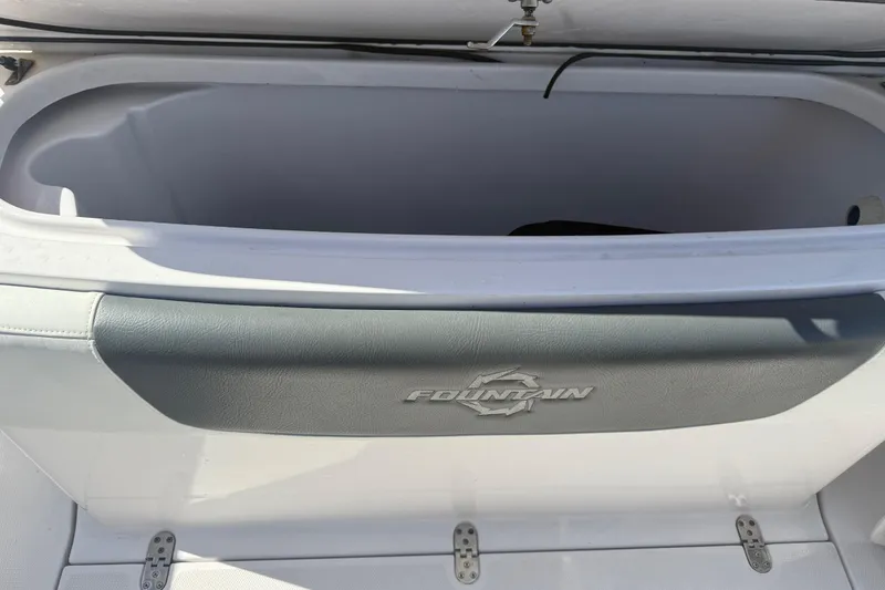 Slide: The Image of Open storage compartment on 2017 Fountain 38 Sportfish Cruiser boat. - 9