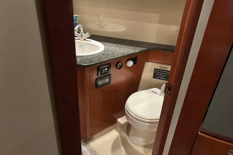 Slide: The Image of Bathroom interior of 2005 Cruisers 500 yacht with sink and toilet. - 22
