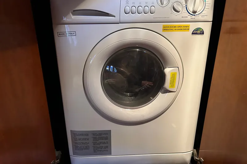 Slide: The Image of Front-loading washing machine, Cruisers 500 model, 2005, made in Italy, with control dials. - 26