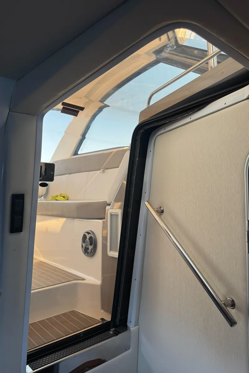 Slide: The Image of 2016 Regal 35 Sport Coupe interior with sleek design and modern features. - 34