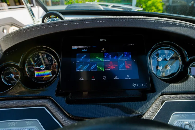 Slide: The Image of Dashboard of 2021 Monterey 255SS Super Sport with digital display and gauges. - 14