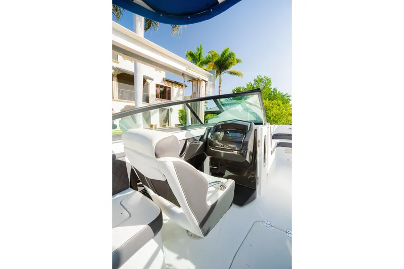 Slide: The Image of Interior of 2021 Monterey 255SS Super Sport boat with modern seating and dashboard. - 7
