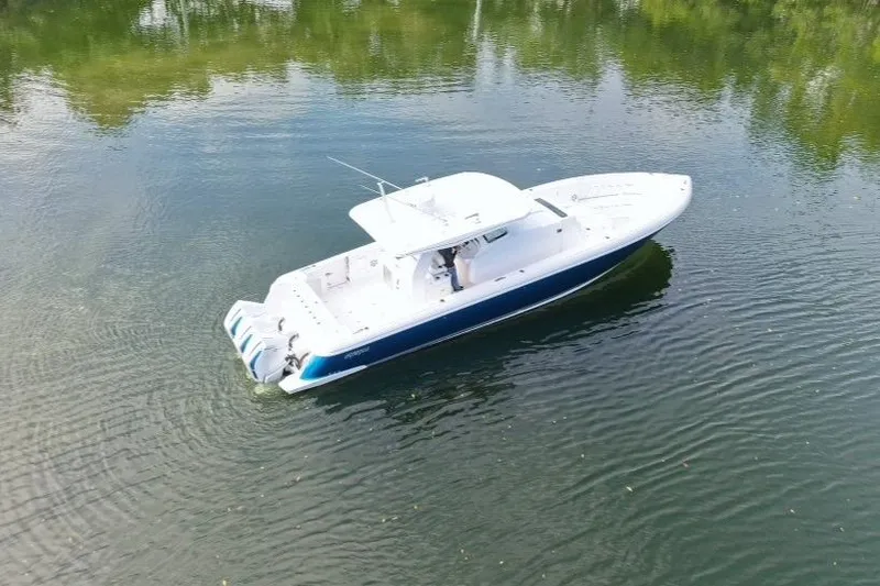 Slide: The Image of 2022 Intrepid 407 Panacea boat on calm water, aerial view. - 1