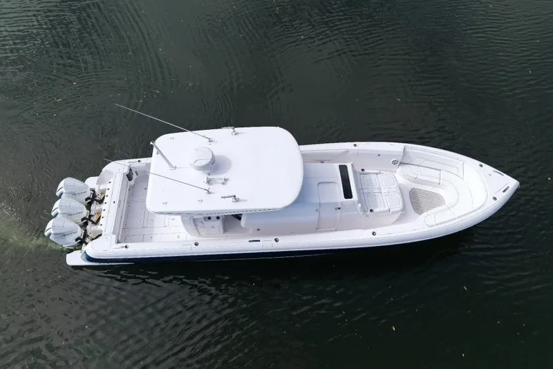 Slide: The Image of 2022 Intrepid 407 Panacea boat on water, aerial view. - 10