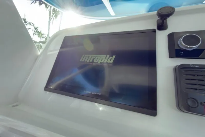 Slide: The Image of 2022 Intrepid 407 Panacea dashboard with Garmin display and control panel. - 102