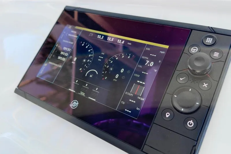 Slide: The Image of Dashboard display of 2022 Intrepid 407 Panacea boat, showing navigation and performance metrics. - 104