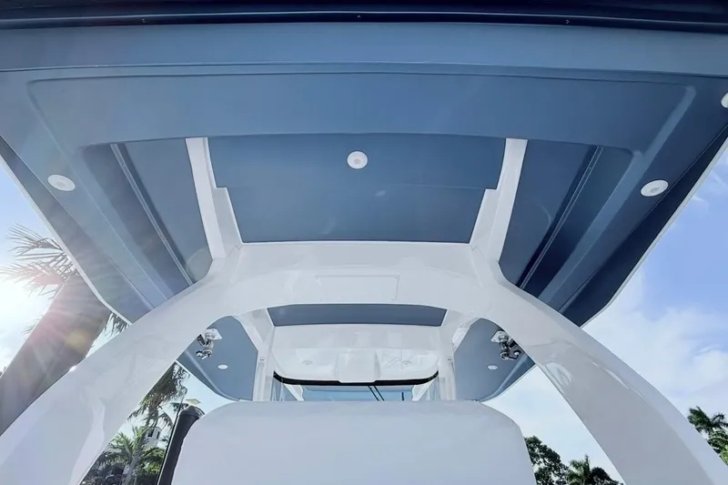 Slide: The Image of 2022 Intrepid 407 Panacea boat canopy with sleek design and modern features. - 12