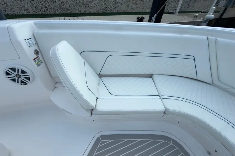 Slide: The Image of Luxurious seating on 2022 Intrepid 407 Panacea boat, featuring white quilted upholstery. - 133
