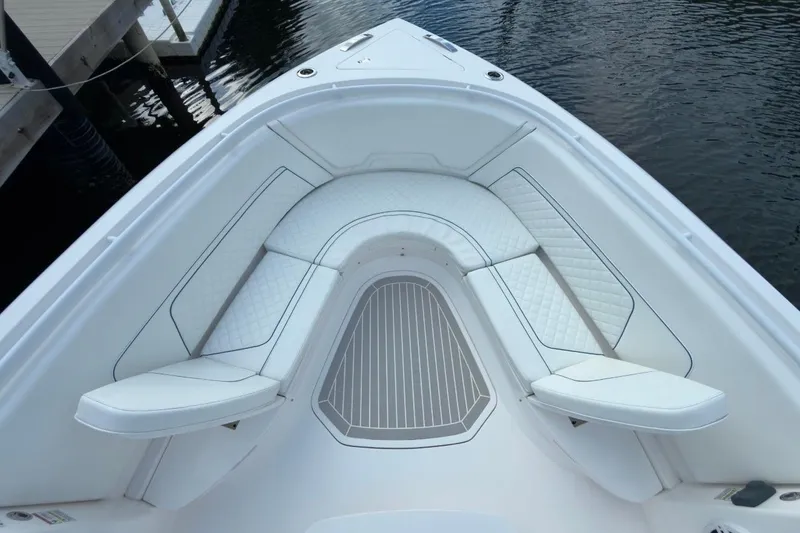 Slide: The Image of 2022 Intrepid 407 Panacea boat with luxurious white seating and sleek design. - 134