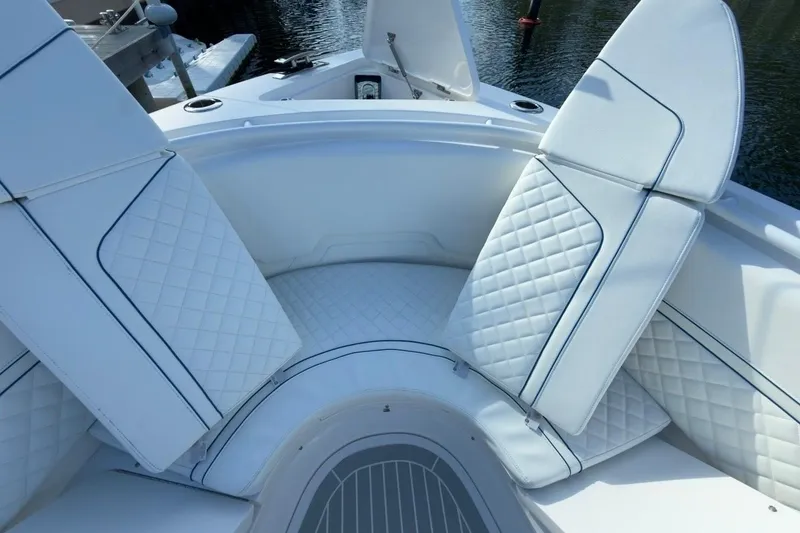 Slide: The Image of 2022 Intrepid 407 Panacea boat with luxurious white seating and quilted upholstery. - 144