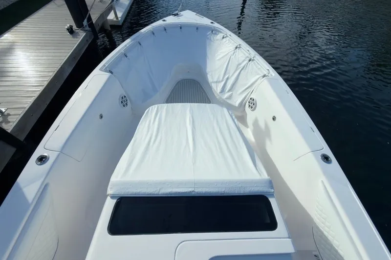 Slide: The Image of 2022 Intrepid 407 Panacea boat deck with white seating and water view. - 20