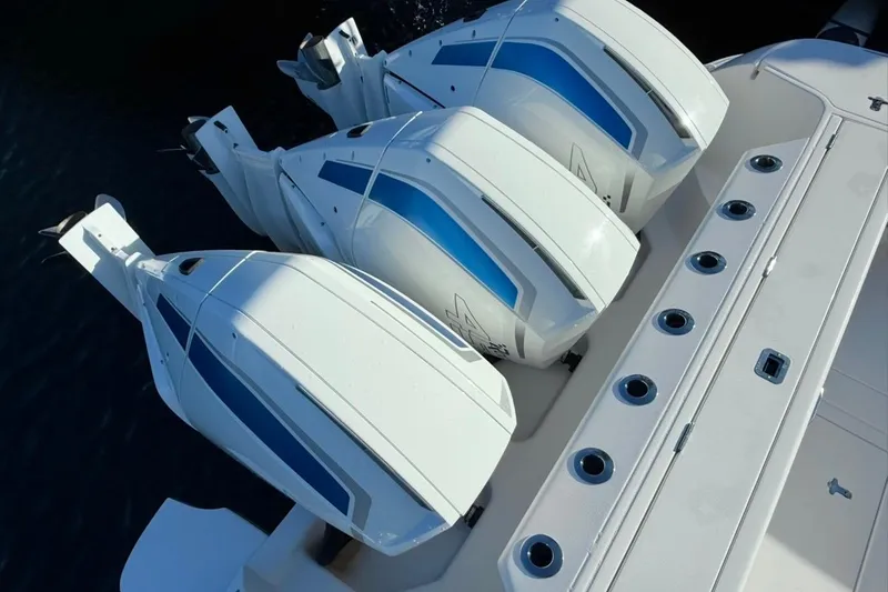 Slide: The Image of 2022 Intrepid 407 Panacea with triple outboard engines, top view. - 26