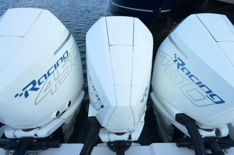 Slide: The Image of Triple Mercury Racing 450R outboard engines on a 2022 Intrepid 407 Panacea boat. - 27