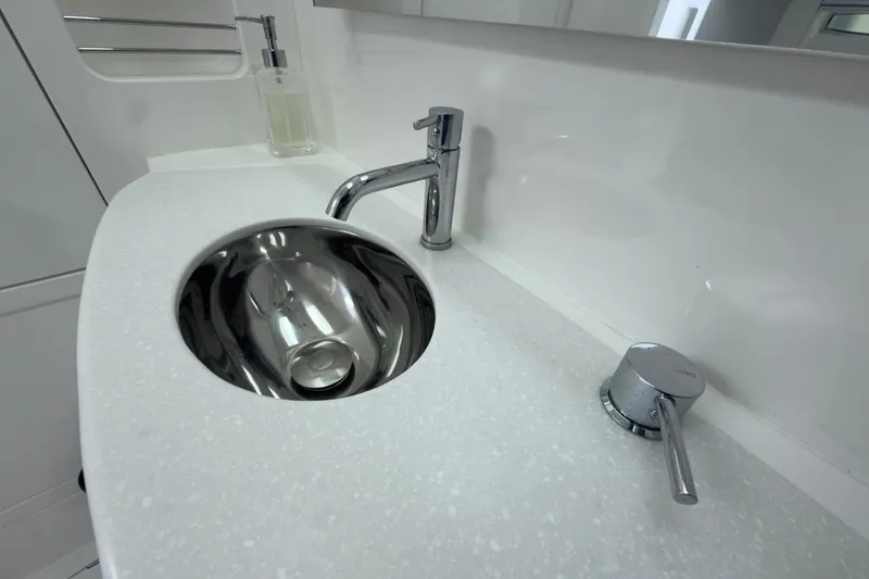 Slide: The Image of Modern bathroom sink in 2022 Intrepid 407 Panacea boat, featuring sleek chrome fixtures. - 42