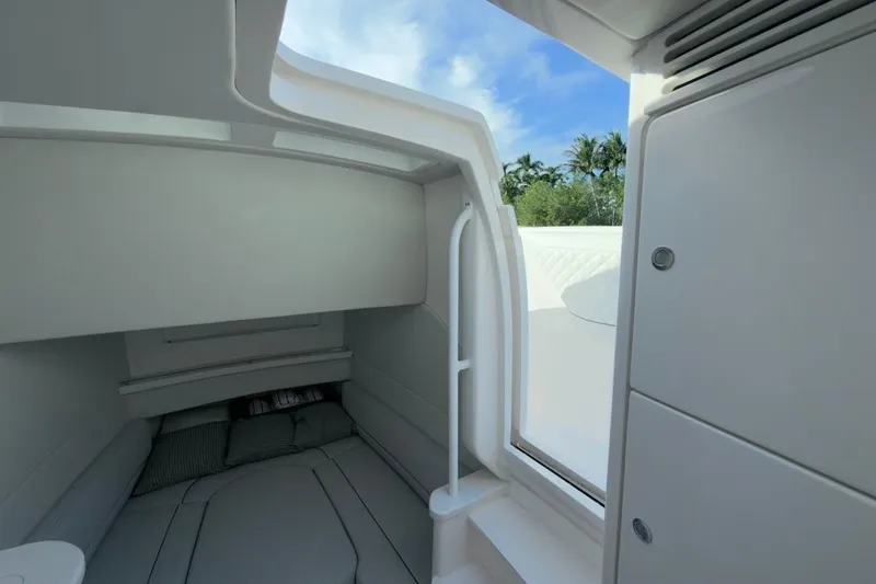 Slide: The Image of 2022 Intrepid 407 Panacea cabin interior with modern design and natural light. - 43