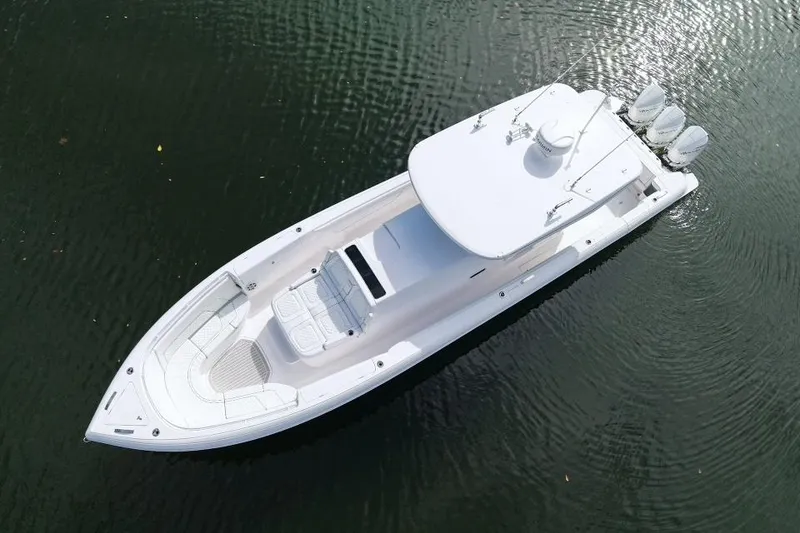 Slide: The Image of Aerial view of 2022 Intrepid 407 Panacea boat on calm water. - 5