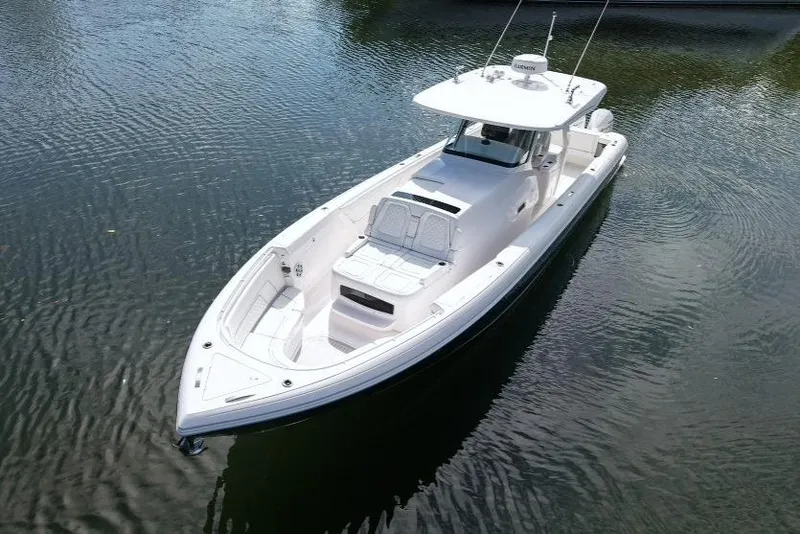 Slide: The Image of 2022 Intrepid 407 Panacea boat on calm water, aerial view. - 6