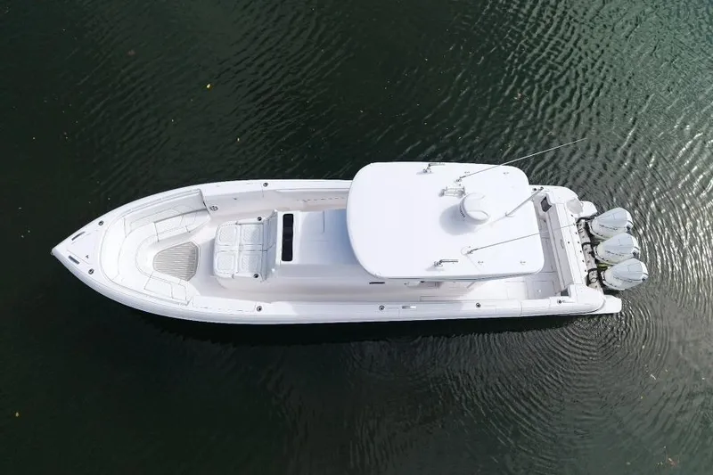 Slide: The Image of Aerial view of 2022 Intrepid 407 Panacea boat on calm water. - 7