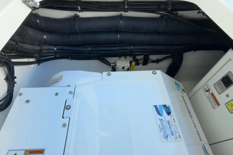 Slide: The Image of Engine compartment of a 2022 Intrepid 407 Panacea boat with Seakeeper system. - 75
