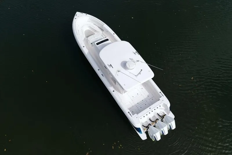 Slide: The Image of Aerial view of 2022 Intrepid 407 Panacea boat on calm water. - 8