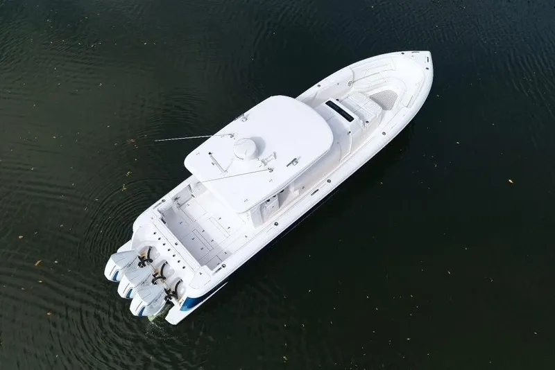 Slide: The Image of Aerial view of 2022 Intrepid 407 Panacea boat on calm water. - 9