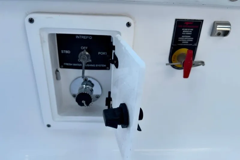Slide: The Image of Control panel of 2022 Intrepid 407 Panacea boat with fresh water flushing system. - 90