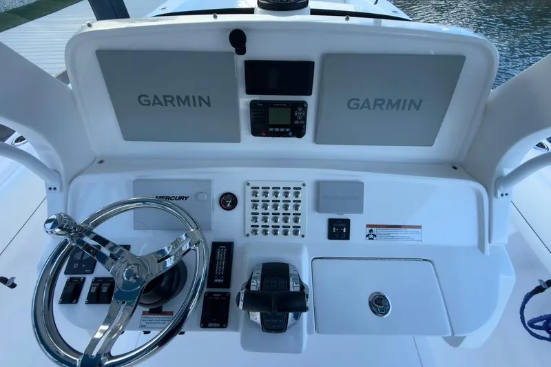 Slide: The Image of Control panel of 2022 Intrepid 407 Panacea boat with Garmin navigation system. - 92