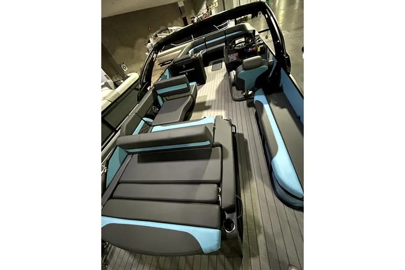 Slide: The Image of 2026 Godfrey Monaco 255 SFL interior with sleek black and blue seating design. - 10