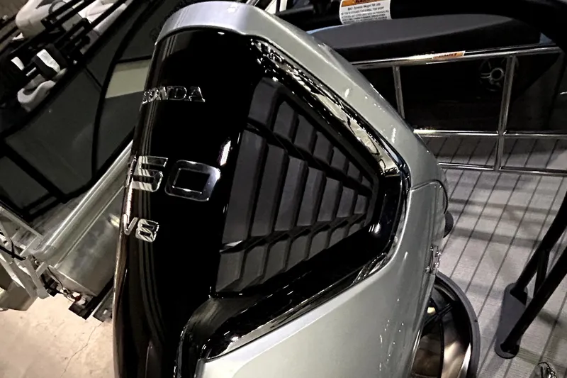 Slide: The Image of Outboard motor on 2026 Godfrey Monaco 255 SFL pontoon boat, showcasing Honda V8 engine. - 13