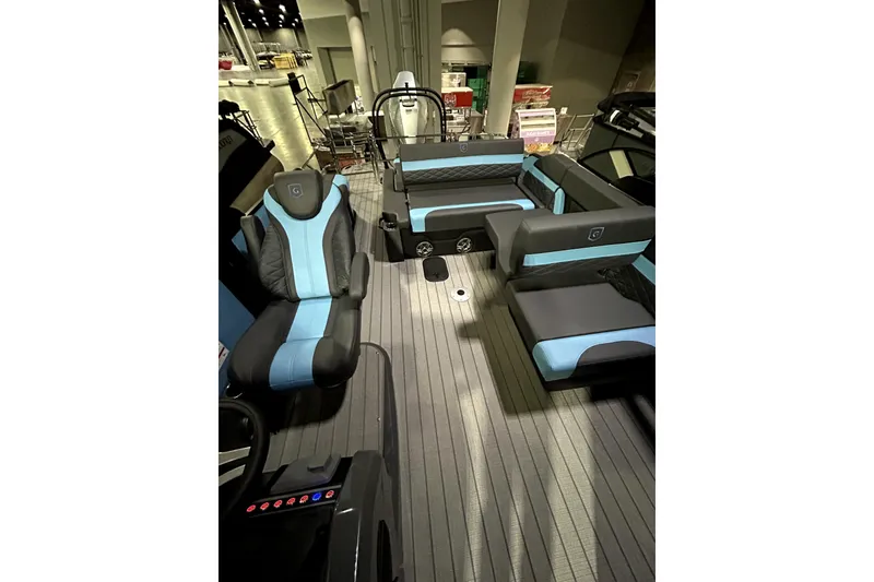 Slide: The Image of 2026 Godfrey Monaco 255 SFL boat interior with modern seating and sleek design. - 4