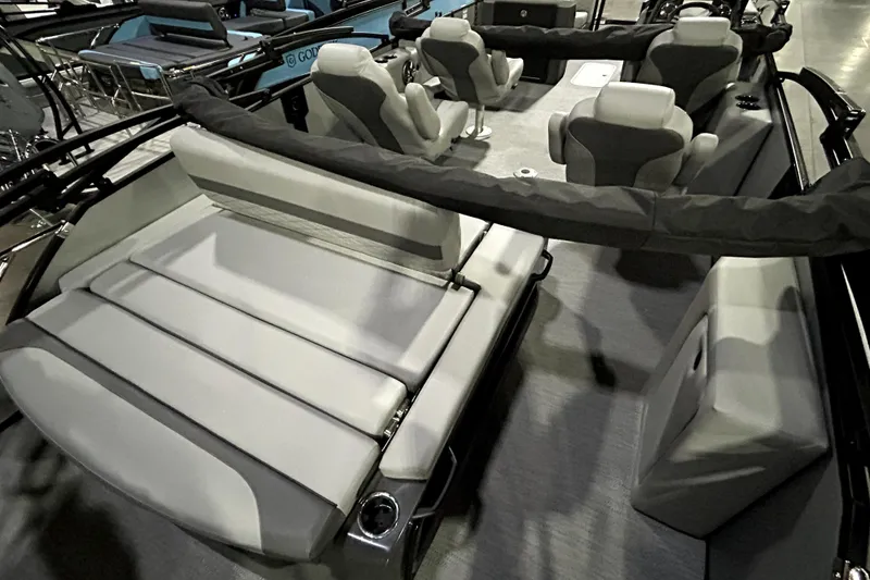 Slide: The Image of Luxurious interior of 2026 Godfrey Monaco 255 QSL pontoon boat with plush seating. - 9