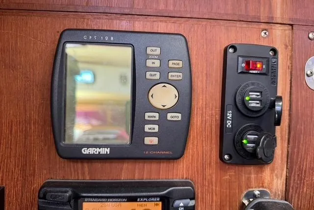 Slide: The Image of Garmin GPS and control panel on 1989 Island Packet 35 sailboat. - 47