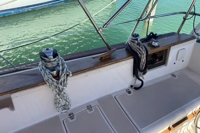 Slide: The Image of Cockpit view of 1989 Island Packet 35 sailboat with winches and ropes. - 6