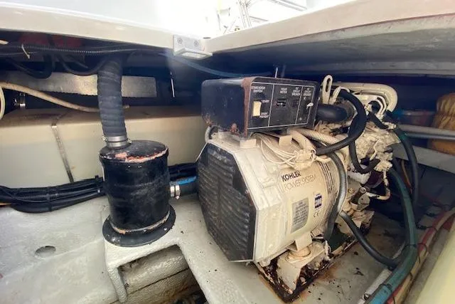 Slide: The Image of Engine room of 1999 Mainship 350 Trawler with Kohler generator. - 53