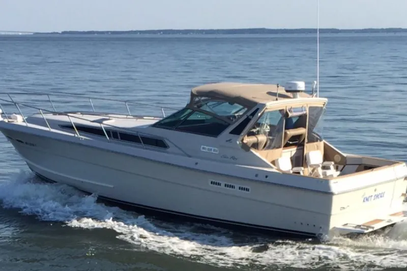 The Image of 1988 Sea Ray 390 Express Cruiser on the water. - 0