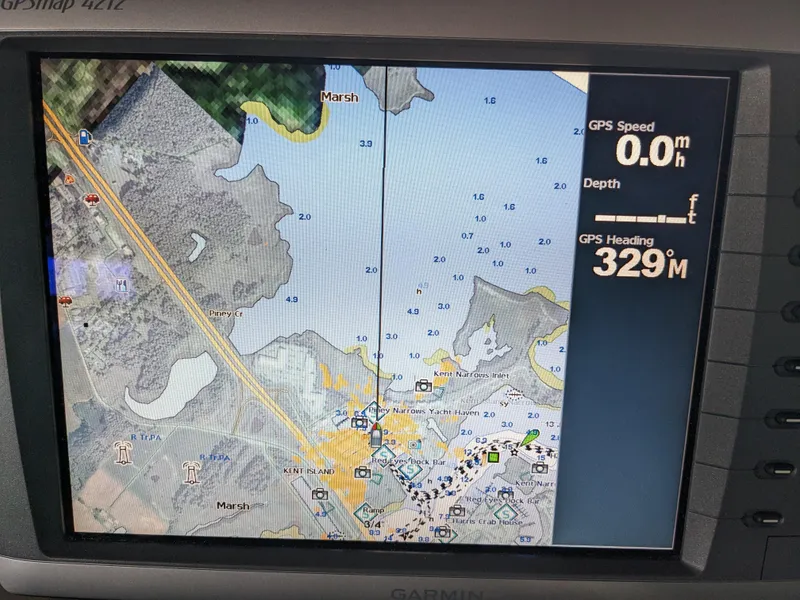 Slide: The Image of Garmin GPS display on 1988 Sea Ray 390 Express Cruiser showing map and navigation data. - 11